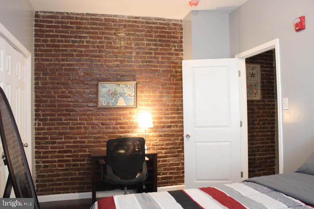 5923 North Broad Street, Unit 1 Philadelphia, PA 19141 - Photo 19 of 25 a bathroom with a sink and a shower