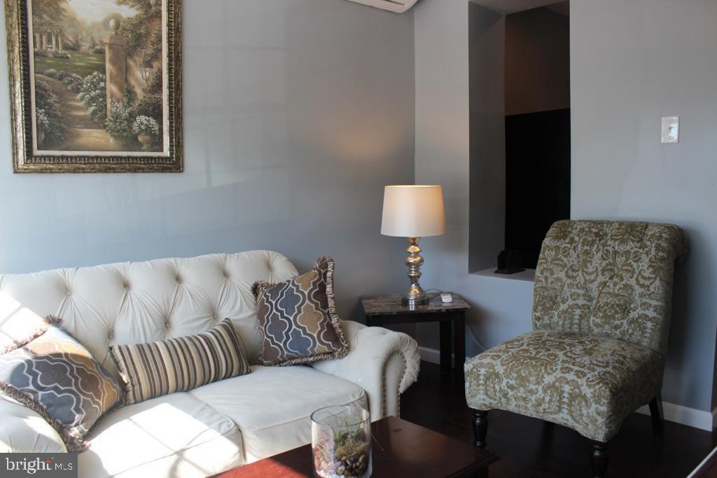 5923 North Broad Street, Unit 1 Philadelphia, PA 19141 - Photo 2 of 25 a living room with furniture