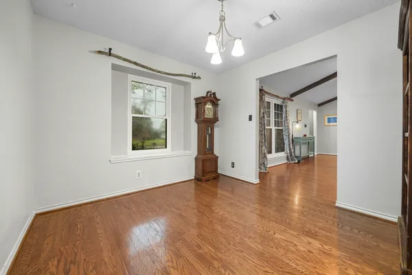 a view of empty room with windows
