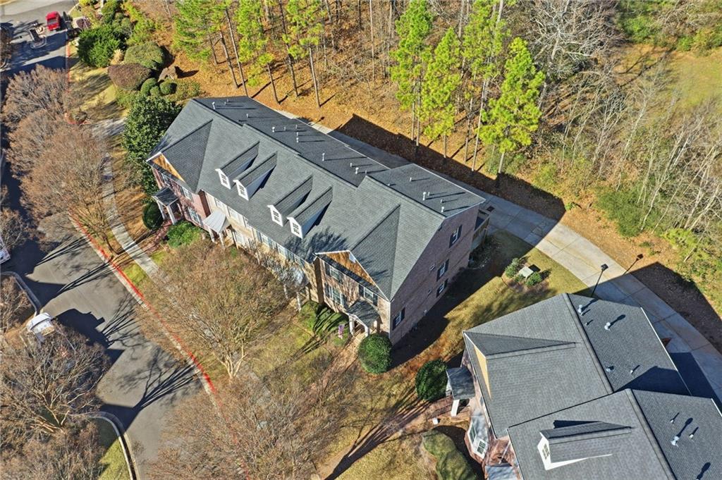 1440 Ferocity Ridge Way Northwest, Unit 17 Kennesaw, GA 30152 - Photo 39 of 42 a view of a house with a yard