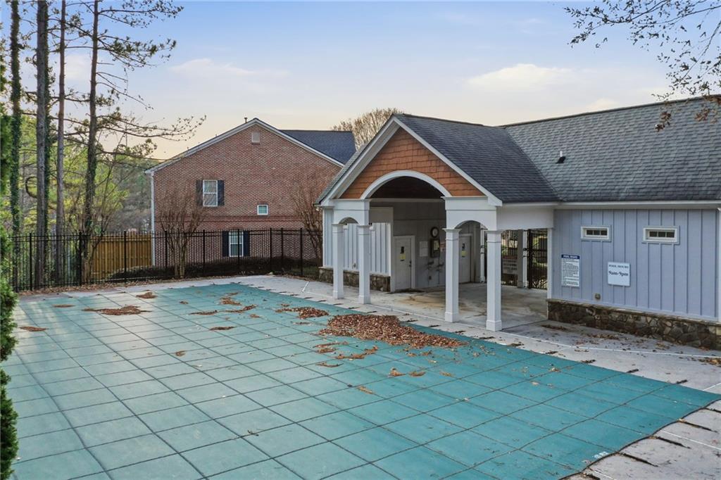 1440 Ferocity Ridge Way Northwest, Unit 17 Kennesaw, GA 30152 - Photo 42 of 42 a front view of a house with a yard