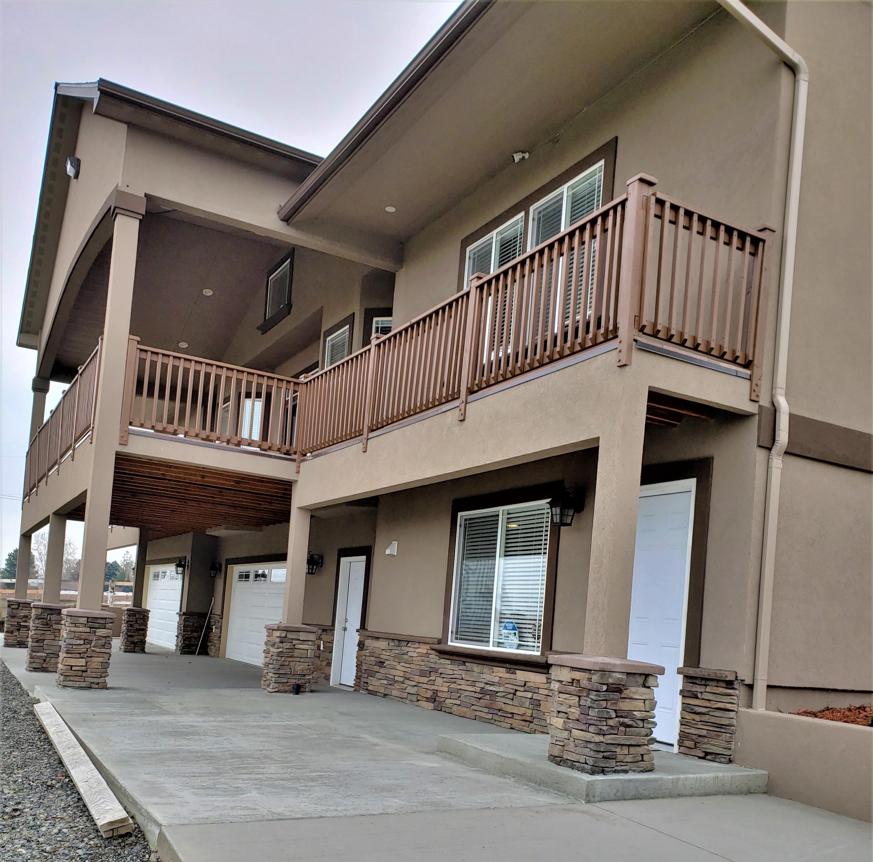 1201 Northwest Crescent Road Sunnyside, WA 98944 - Photo 1 of 35 a view of a porch with seating space