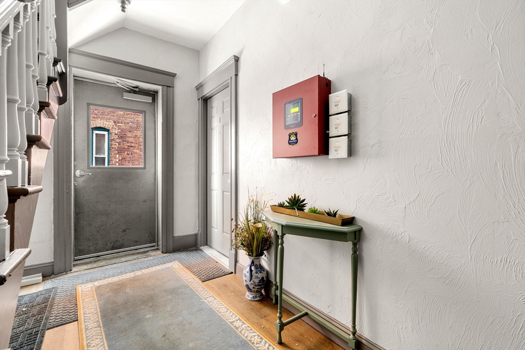 70-72 Russell Street Worcester, MA 01609 - Photo 6 of 30 a view of a hallway with workspace