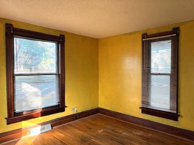 301 South Grape Street Morrison, IL 61270 - Photo 12 of 25 a view of a room with wooden floor and a window