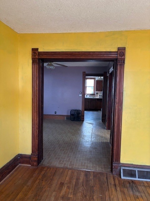 301 South Grape Street Morrison, IL 61270 - Photo 13 of 25 a view of a room with wooden floor and a window