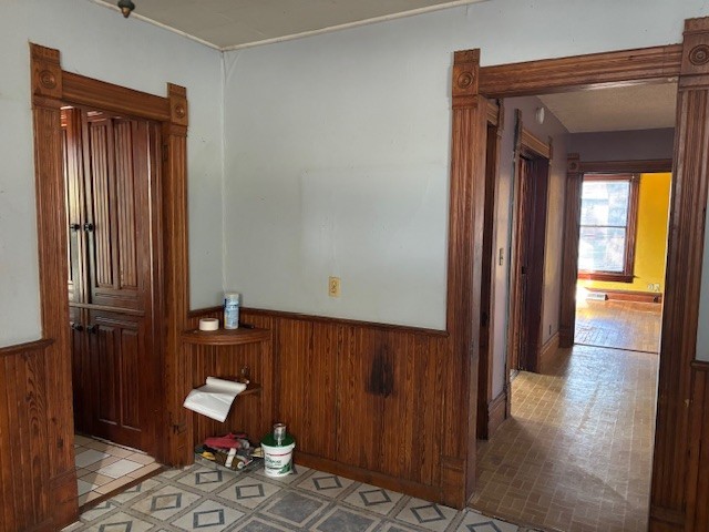 301 South Grape Street Morrison, IL 61270 - Photo 10 of 25 a view of a hallway with wooden floor windows and a bathroom