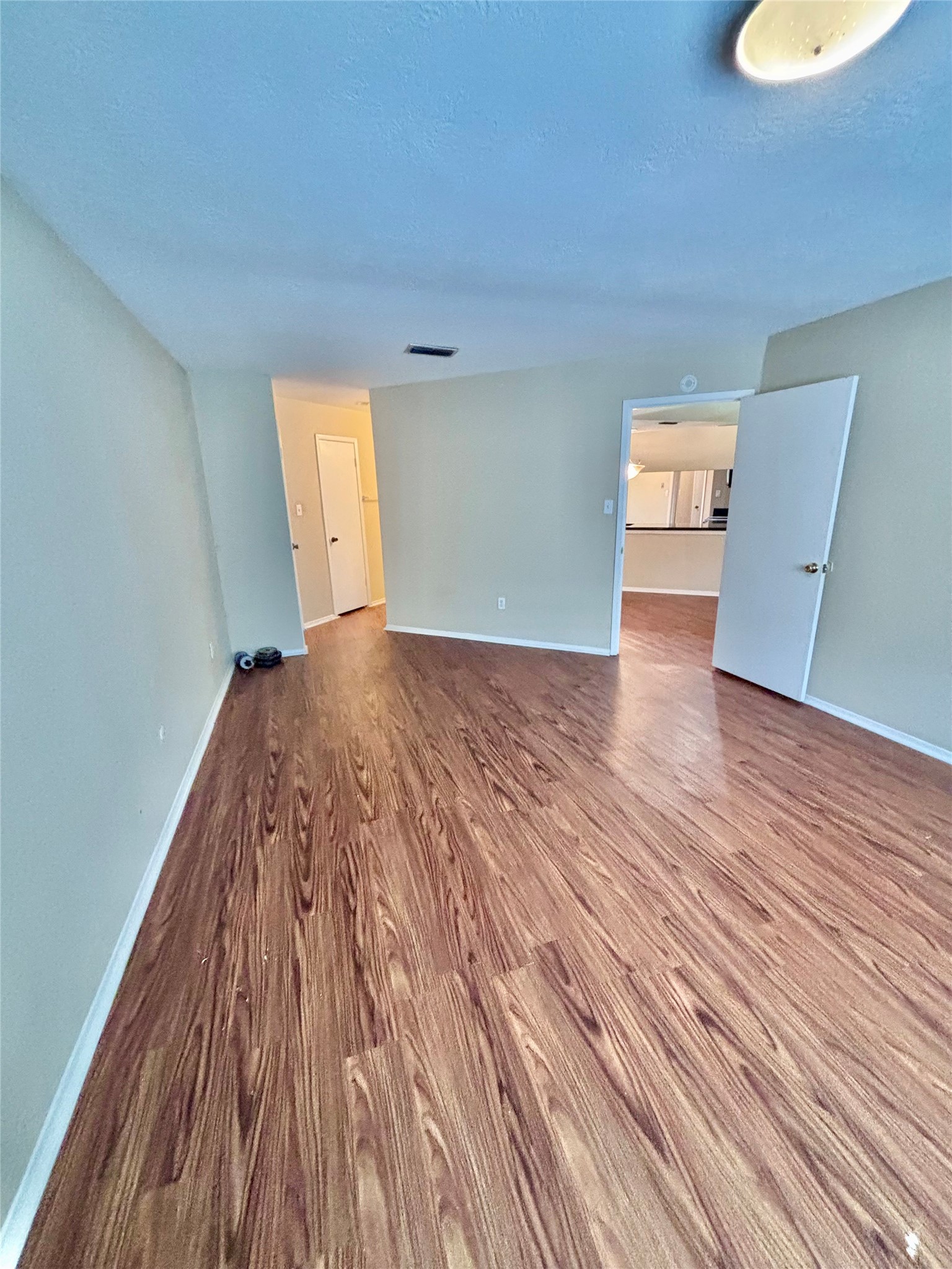 6234 Brookgate Drive Spring, TX 77373 - Photo 9 of 15 a view of empty room with wooden floor