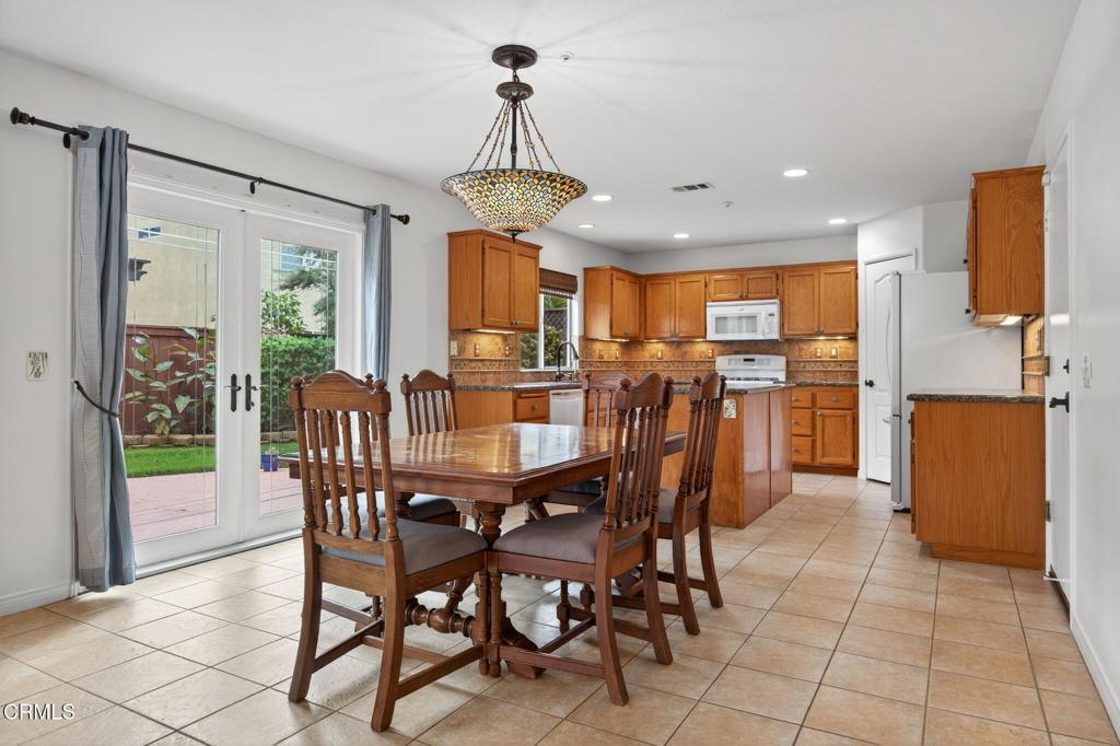 520 Festivo Street Oxnard, CA 93030 - Photo 13 of 31 a view of a dining room with furniture window and outside view