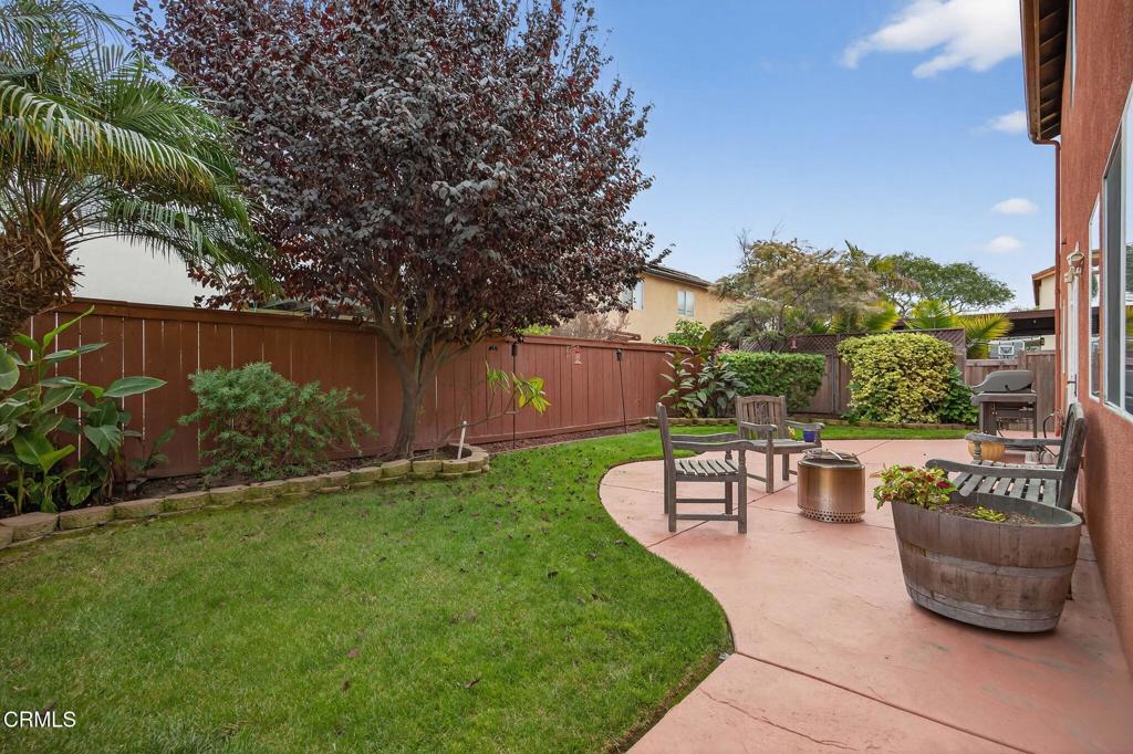520 Festivo Street Oxnard, CA 93030 - Photo 26 of 31 a view of a patio with couches and table and chairs and potted plants