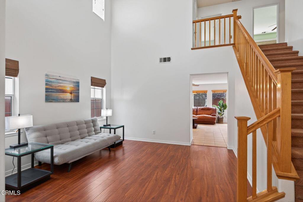 520 Festivo Street Oxnard, CA 93030 - Photo 4 of 31 a living room with furniture and a wooden floor