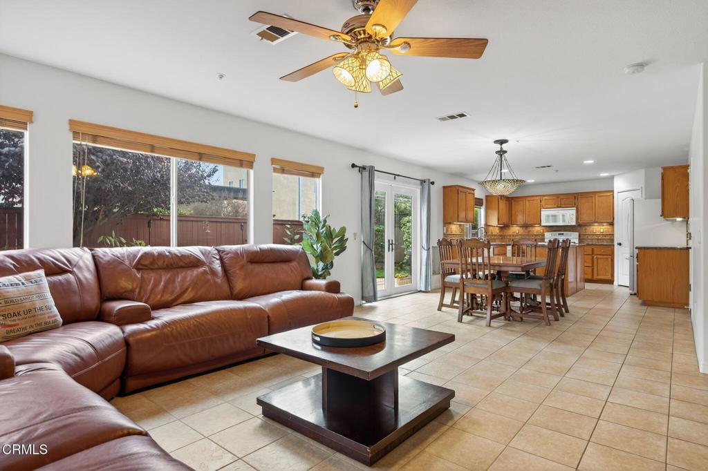 520 Festivo Street Oxnard, CA 93030 - Photo 9 of 31 a living room with furniture and a large window