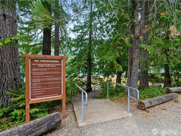 a view of swimming pool with a yard