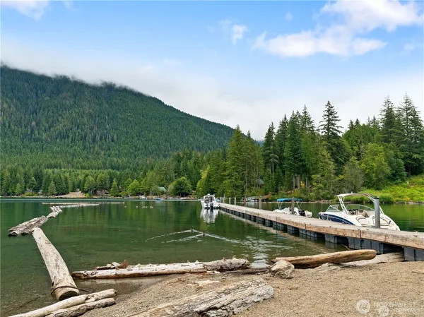 a view of a lake with a yard