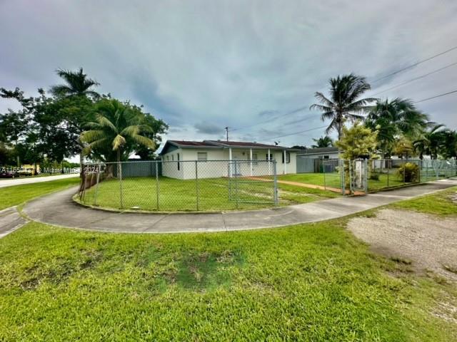29605 Southwest 154th Court Homestead, FL 33033 - Photo 1 of 25 a view of a house with a swimming pool