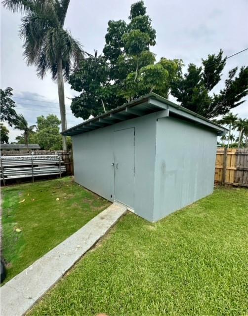 29605 Southwest 154th Court Homestead, FL 33033 - Photo 14 of 25 a view of a backyard with a garden and plants