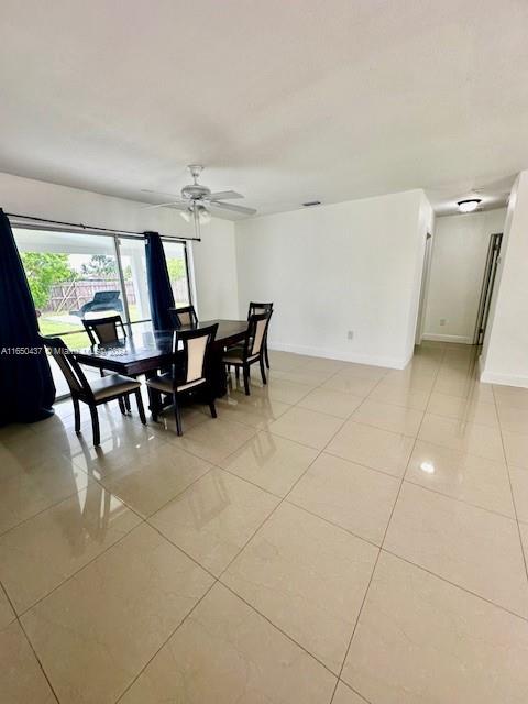 29605 Southwest 154th Court Homestead, FL 33033 - Photo 20 of 25 a dining room with furniture and window
