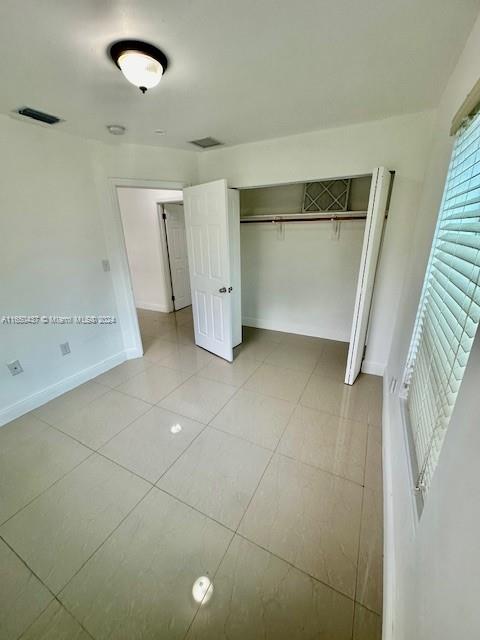 29605 Southwest 154th Court Homestead, FL 33033 - Photo 8 of 25 a view of a livingroom with an empty space