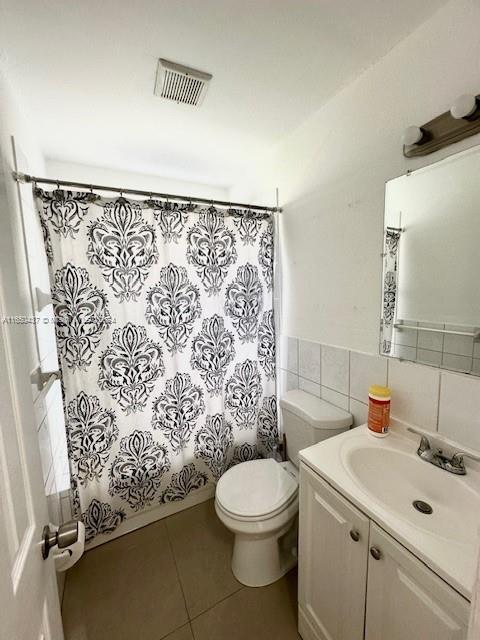 29605 Southwest 154th Court Homestead, FL 33033 - Photo 9 of 25 a bathroom with a sink toilet and shower