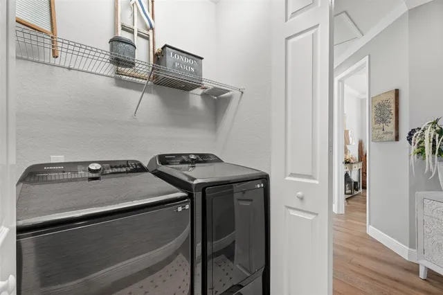a utility room with dryer and washer