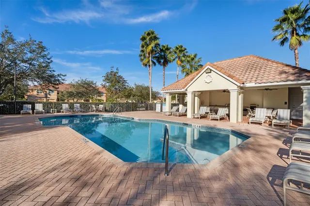 a view of a house with swimming pool