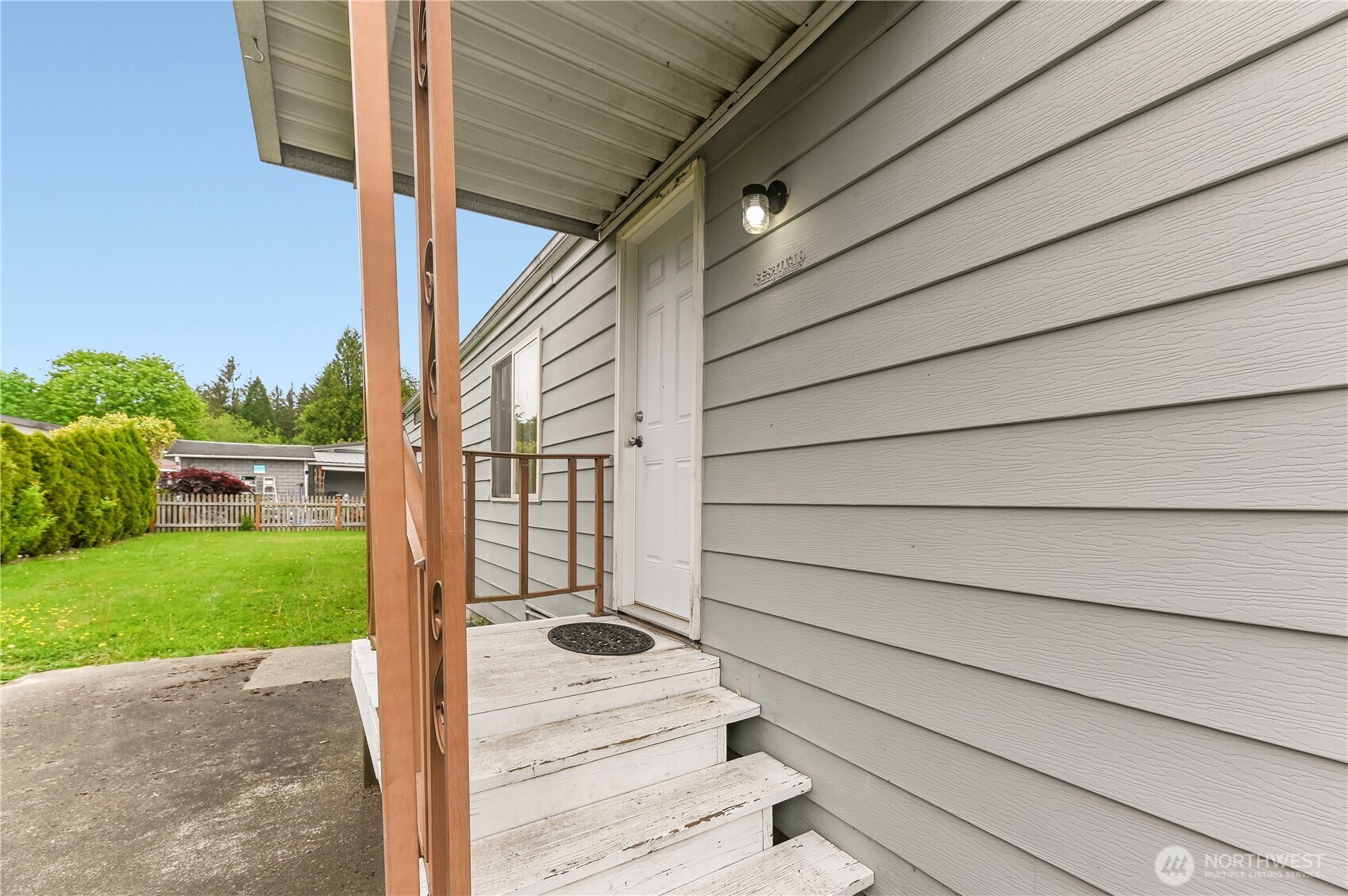 212 Old Owen Road, Unit 7 Sultan, WA 98294 - Photo 1 of 24 a view of house with backyard