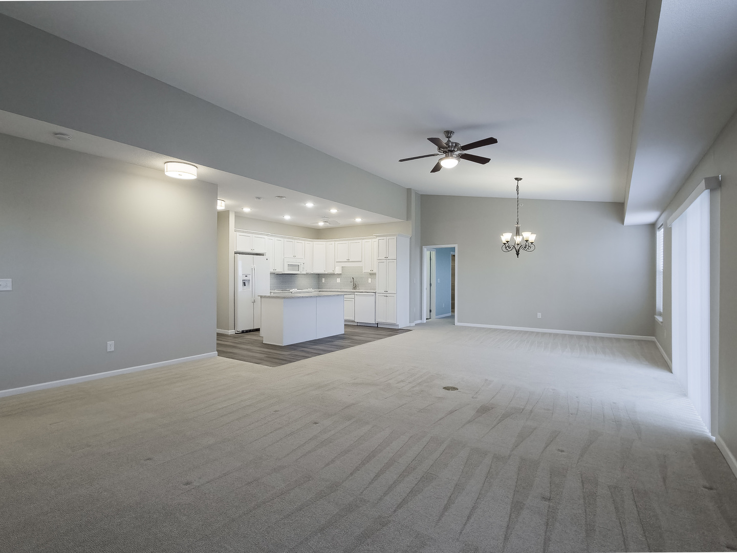 2592 Middle Road, Unit 313 Bettendorf, IA 52722 - Photo 22 of 52 a view of a livingroom with a kitchen