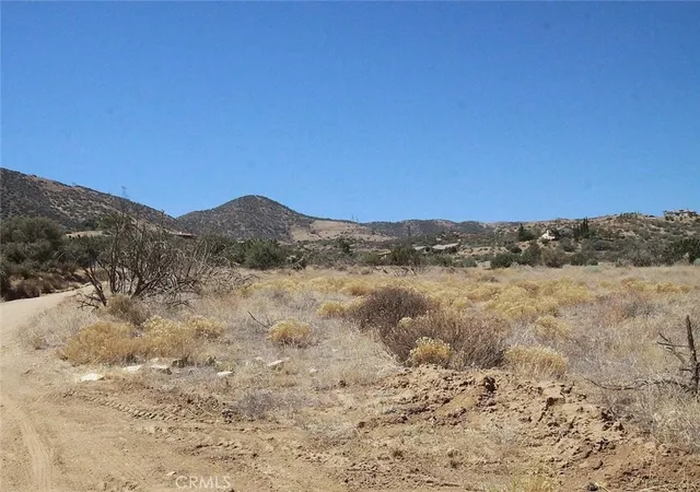 a view of mountain view with mountains in the background