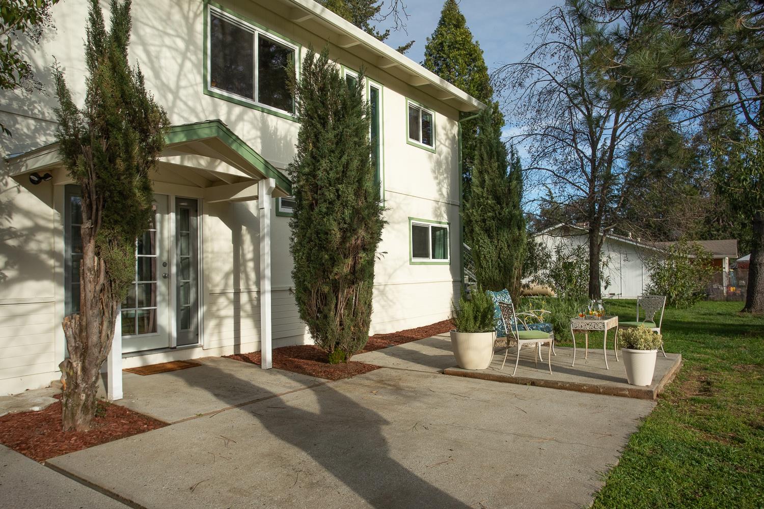 24713 Oro Valley Road Auburn, CA 95602 - Photo 3 of 69 Large patio, great for enjoying the level backyard