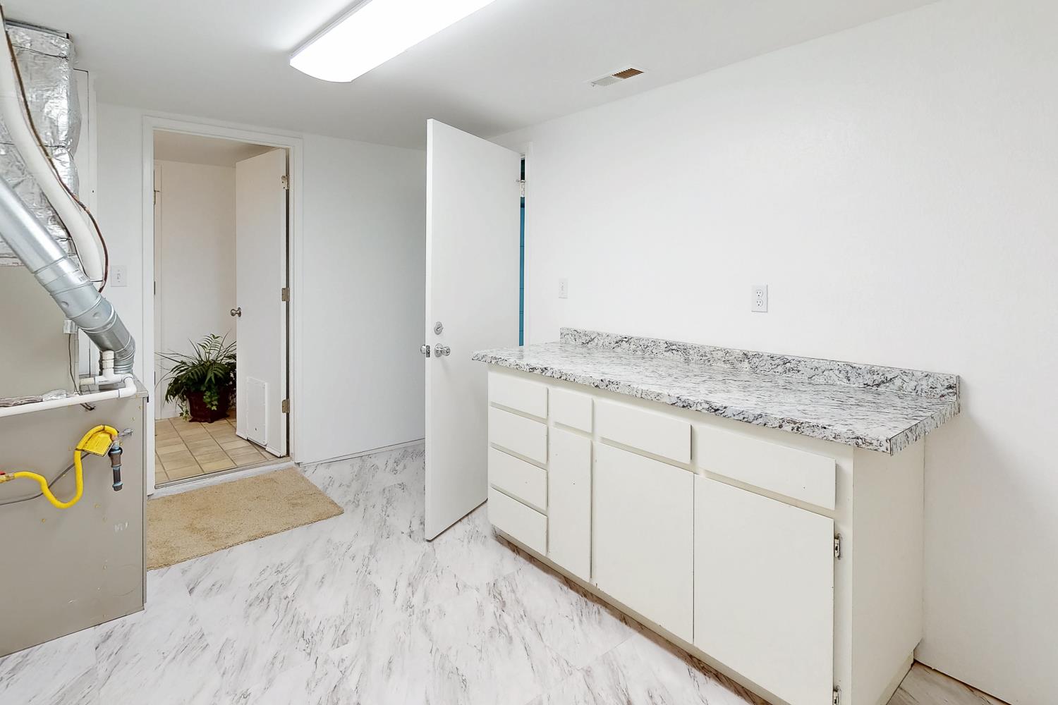 24713 Oro Valley Road Auburn, CA 95602 - Photo 36 of 69 lots of storage in the Laundry room