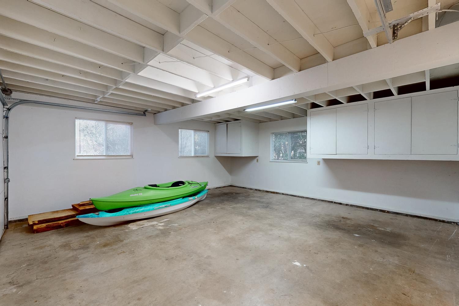 24713 Oro Valley Road Auburn, CA 95602 - Photo 37 of 69 over sized garage with shop area and tons of storage