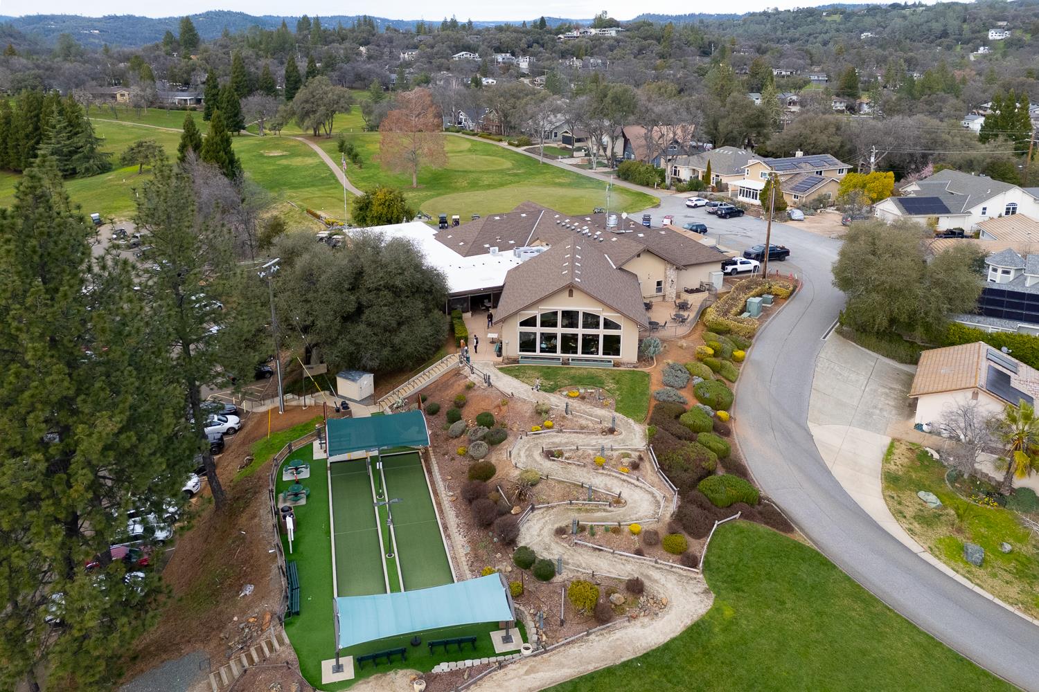 24713 Oro Valley Road Auburn, CA 95602 - Photo 66 of 69 Sports lounge with bocce ball and driving range