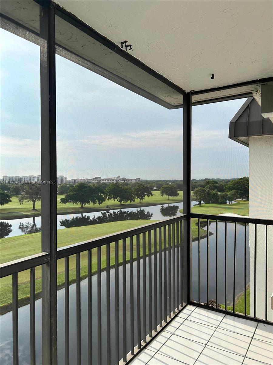 3100 West Rolling Hills Circle, Unit 702 Davie, FL 33328 - Photo 2 of 16 a view of city from a balcony