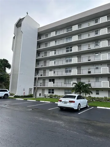 a car parked in front of a building