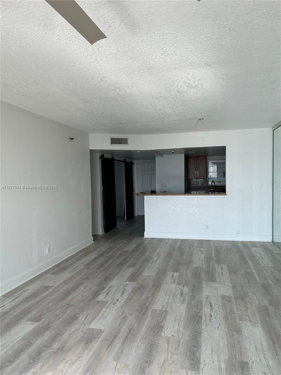 3100 West Rolling Hills Circle, Unit 702 Davie, FL 33328 - Photo 9 of 16 a view of a livingroom with a fireplace