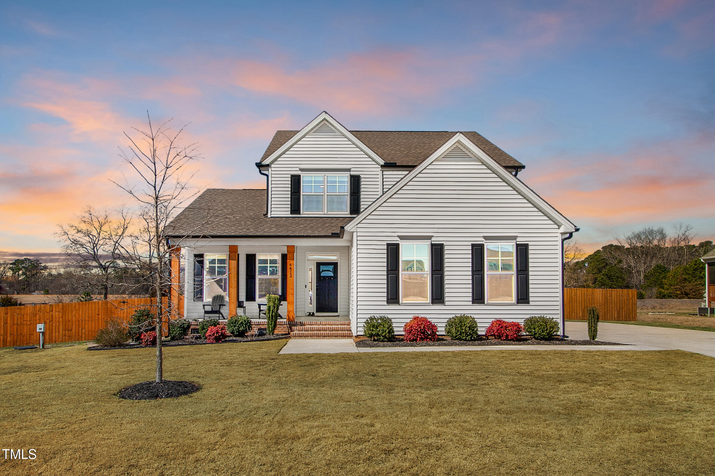 4412 Beckel Road Willow Spring, NC 27592 - Photo 1 of 17 a front view of house with yard and road