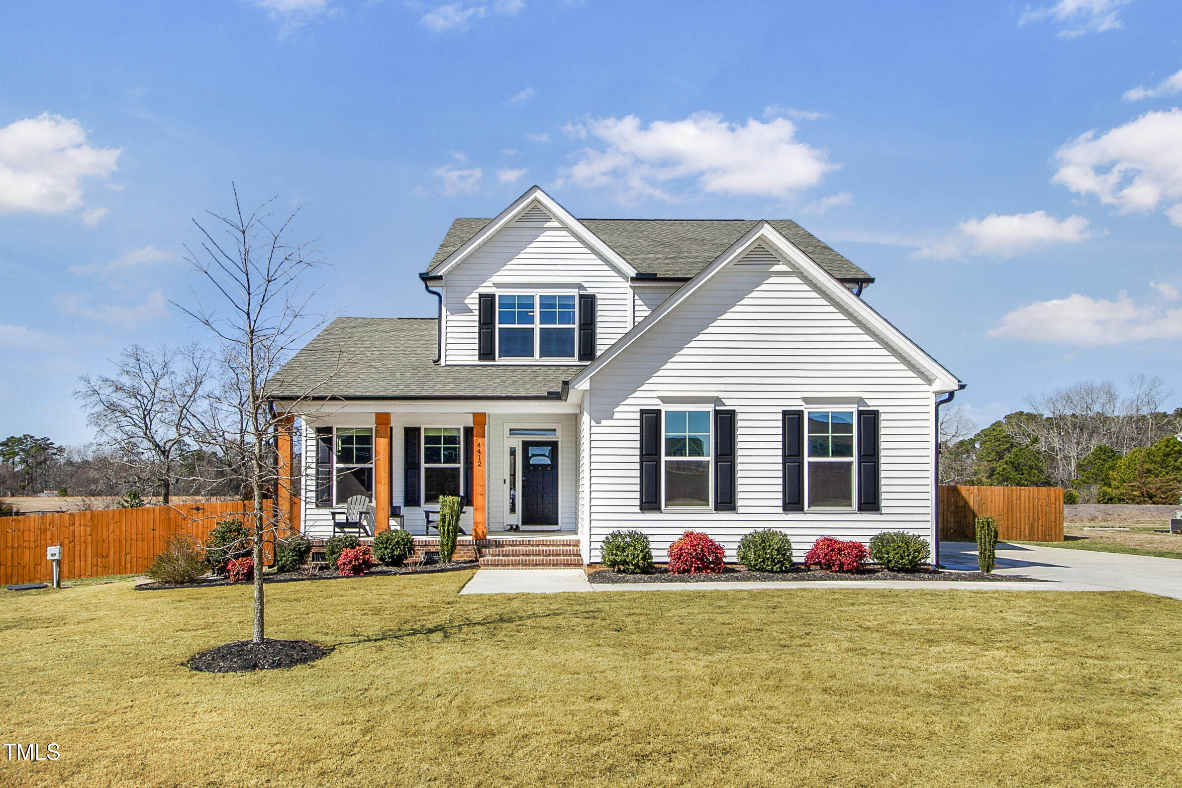 4412 Beckel Road Willow Spring, NC 27592 - Photo 2 of 17 a view of a house with backyard and sitting area