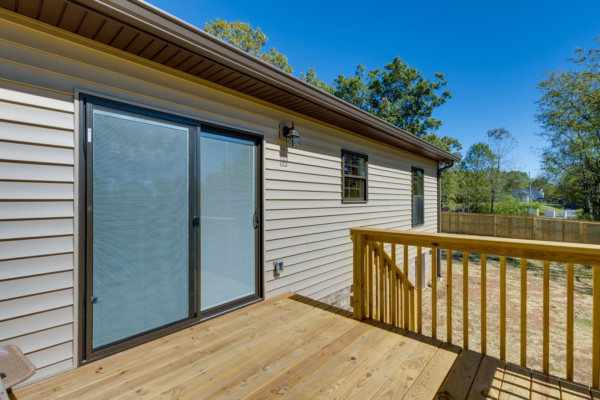 7703 South Swift Road Goodlettsville, TN 37072 - Photo 11 of 12 a view of a balcony with a potted plant