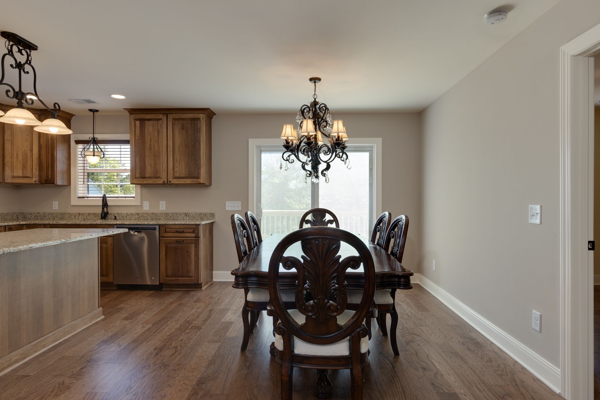 7703 South Swift Road Goodlettsville, TN 37072 - Photo 4 of 12 a view of a dining room with furniture and wooden floor