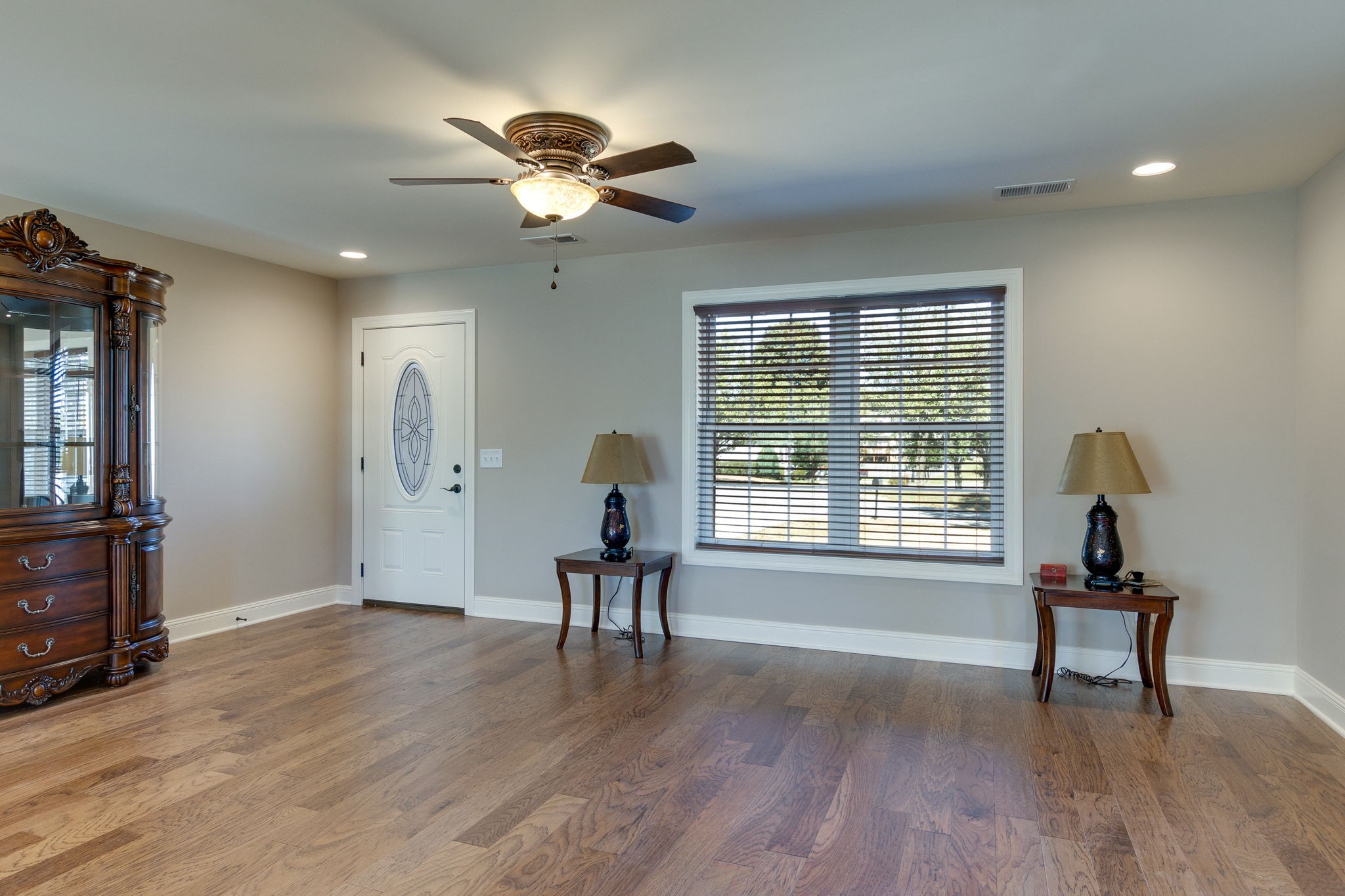 7703 South Swift Road Goodlettsville, TN 37072 - Photo 5 of 12 a view of workspace with wooden floor lounge chair and windows