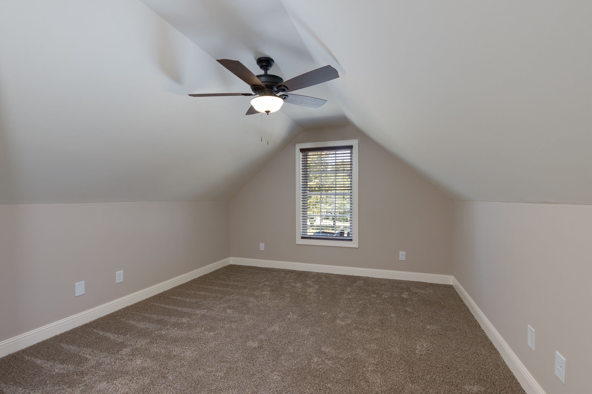 7703 South Swift Road Goodlettsville, TN 37072 - Photo 6 of 12 an empty room with a window and a fan
