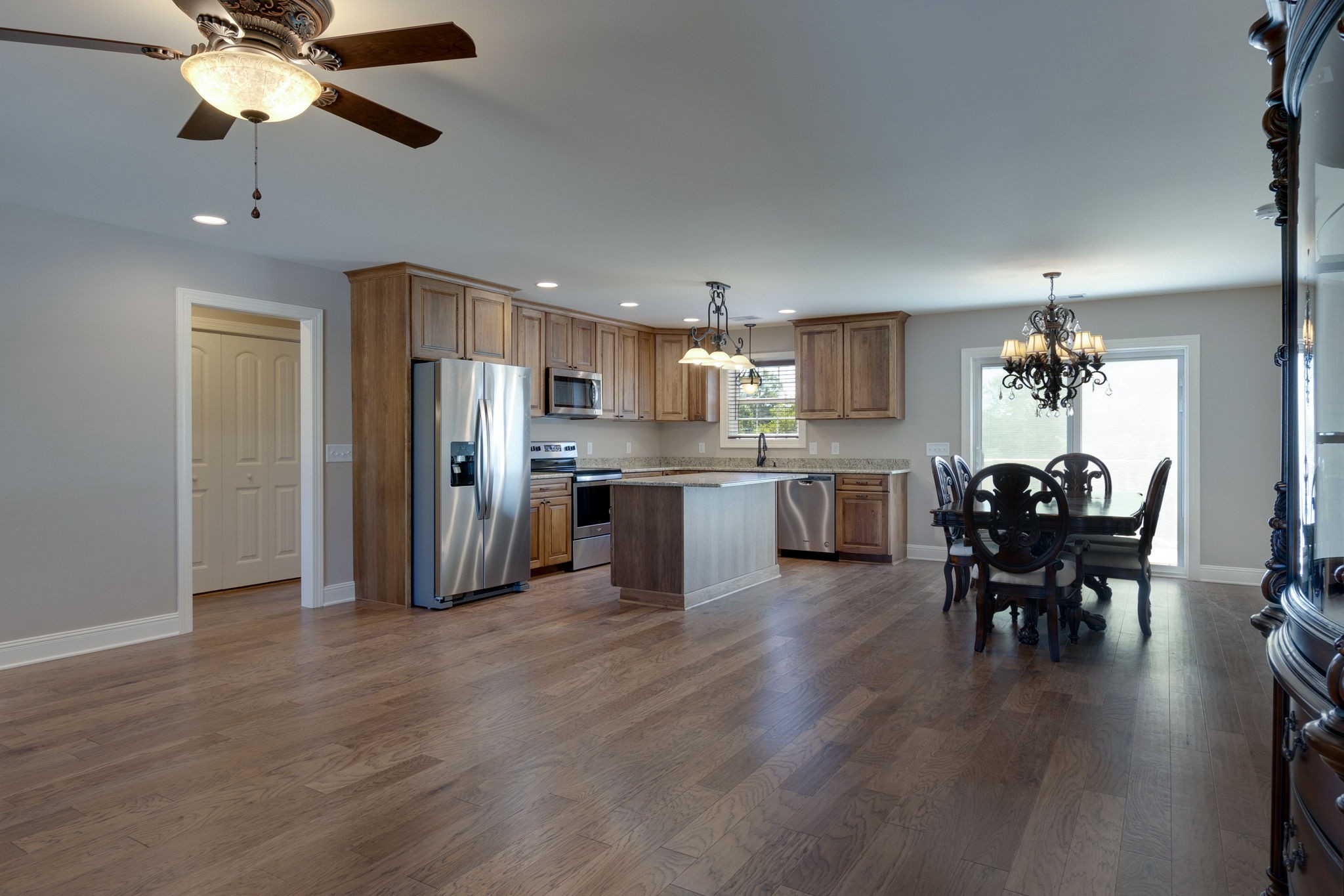 7703 South Swift Road Goodlettsville, TN 37072 - Photo 7 of 12 a view of a dining room with furniture and chandelier