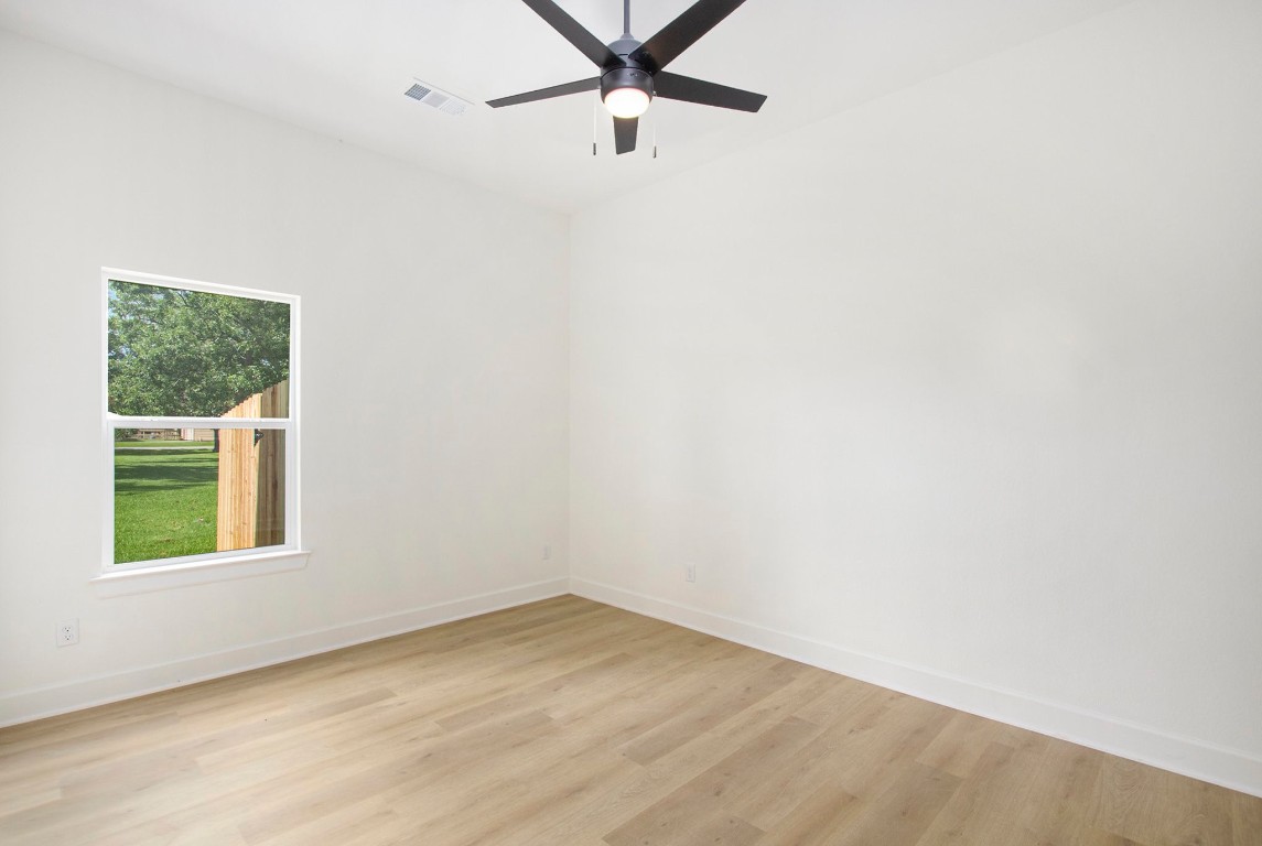 3810 Jackson Street Santa Fe, TX 77517 - Photo 19 of 29 an empty room with a window