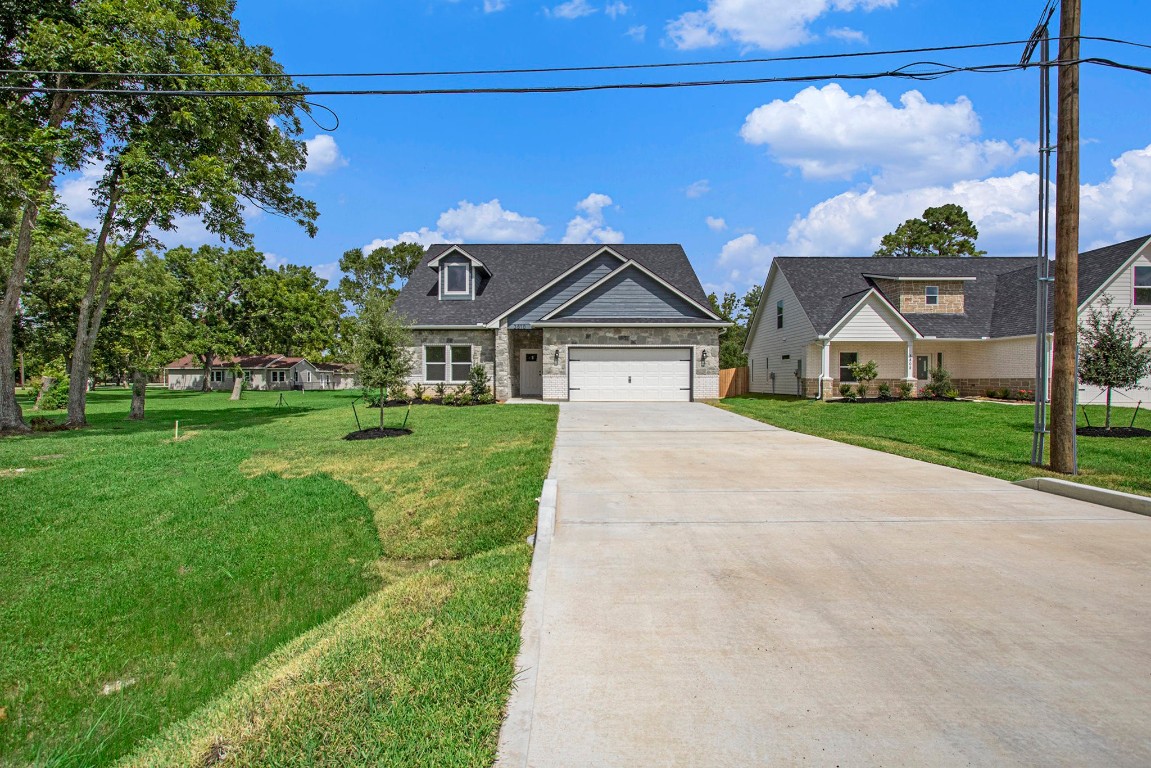 3810 Jackson Street Santa Fe, TX 77517 - Photo 24 of 29 a front view of a house with yard