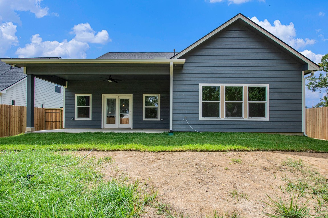 3810 Jackson Street Santa Fe, TX 77517 - Photo 27 of 29 a front view of a house with a yard and garage