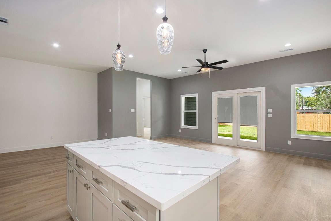 3810 Jackson Street Santa Fe, TX 77517 - Photo 9 of 29 a bedroom with a bed and a ceiling fan