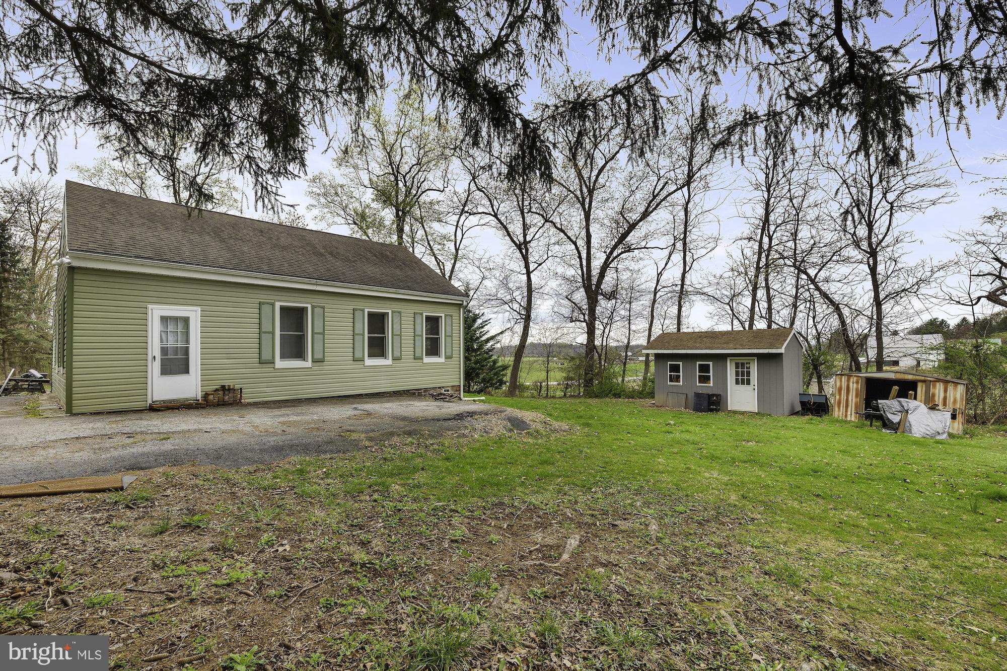 8839 Maple Grove Road Abbottstown, PA 17301 - Photo 9 of 46 front view of a house with a yard