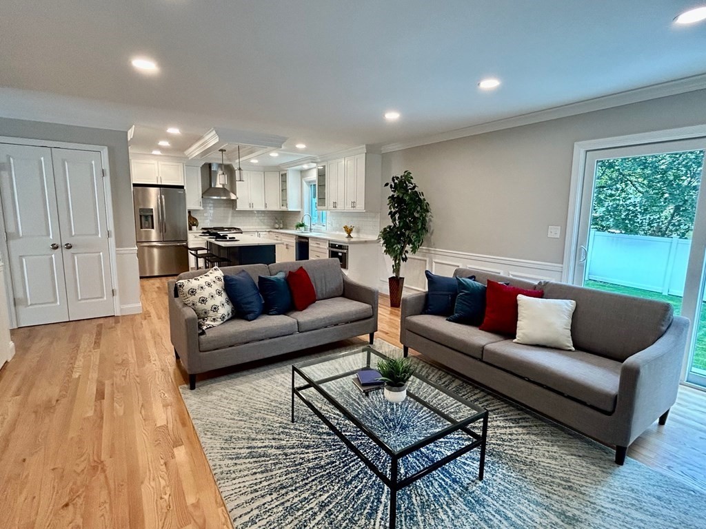 33 Circle Drive Waltham, MA 02452 - Photo 15 of 42 a living room with furniture and a wooden floor