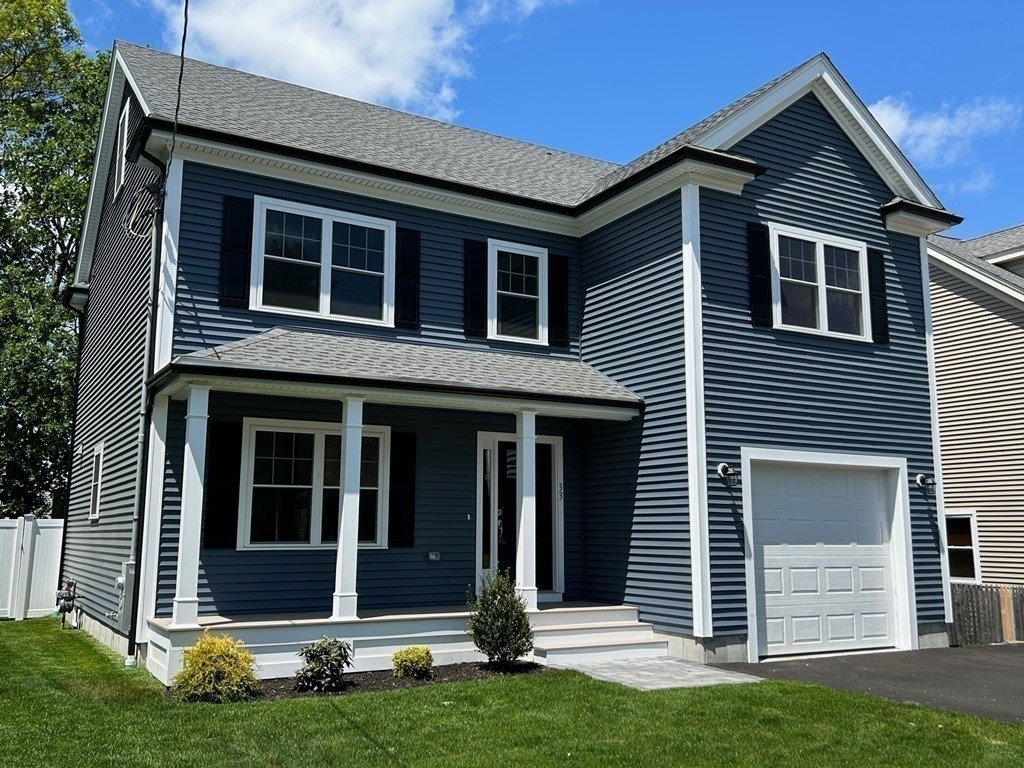33 Circle Drive Waltham, MA 02452 - Photo 39 of 42 a front view of a house with a yard