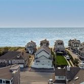 an aerial view of a houses with outdoor space