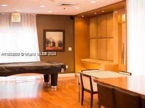 a bathroom with a sink a mirror and a bathtub